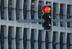 red traffic light hanging in Toronto, Ontario
